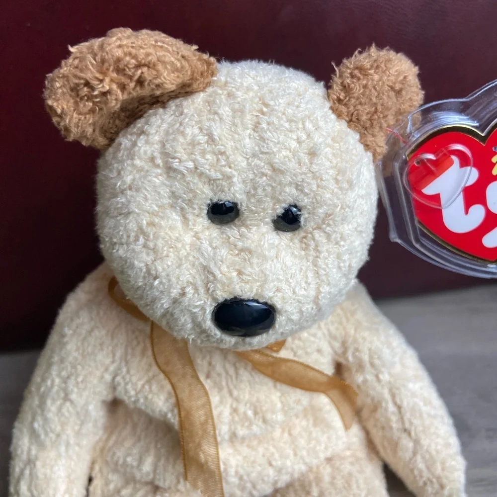 Ty Beanie Baby named Huggy the Bear, released in 2000,‎ NWT